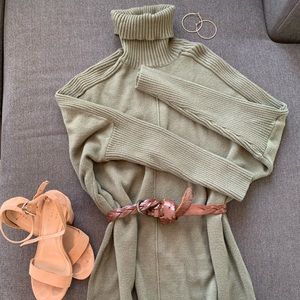 Green turtleneck sweater